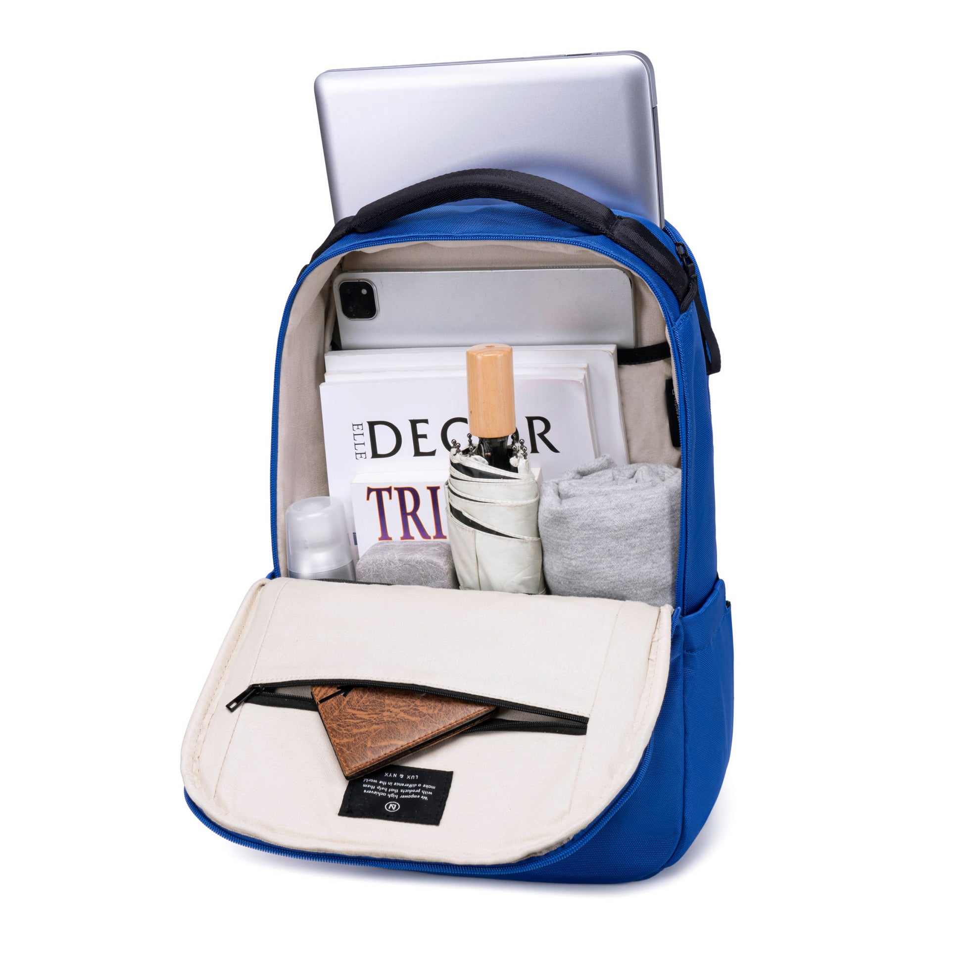 Lux & Nyx Purpose Backpack - 16" Laptop Backpack With Trolley Strap - Electric Blue - Backpack Quarter View of Internal Compartments With Backpack Contents