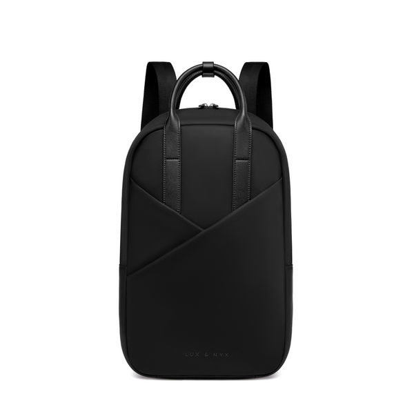Origami Slim Backpack straight-on front view, black nylon with structured silhouette