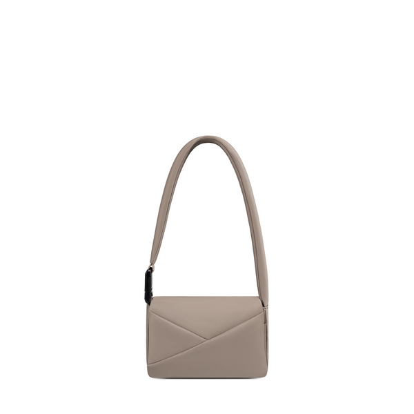 Lux & Nyx Origami Flap Bag in Champagne, crossbody bag presented in its alternate wear as a mini shoulder bag.