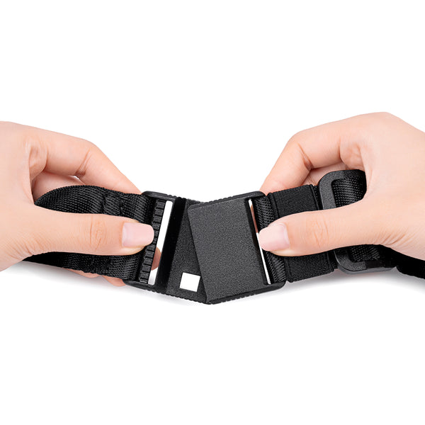 Black belt with a buckle held by two hands