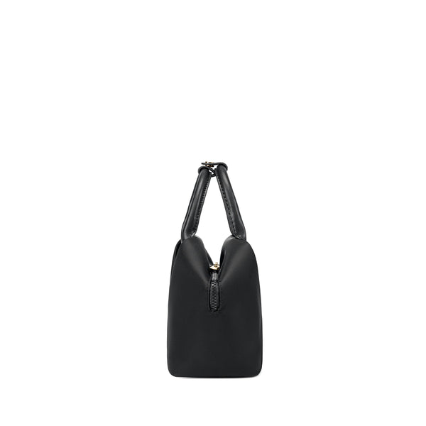Black + Gold Hardware & Black + Silver Hardware handbag with a shoulder strap.
