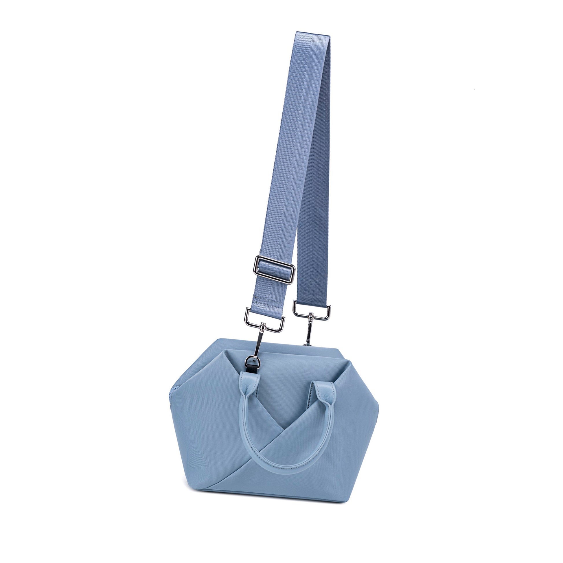 Cashmere Blue geometric handbag with a strap.