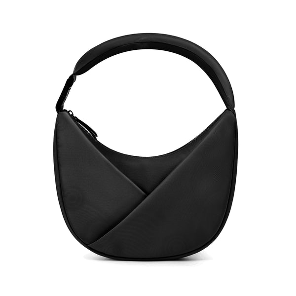 Black handbag with a unique design on a white background