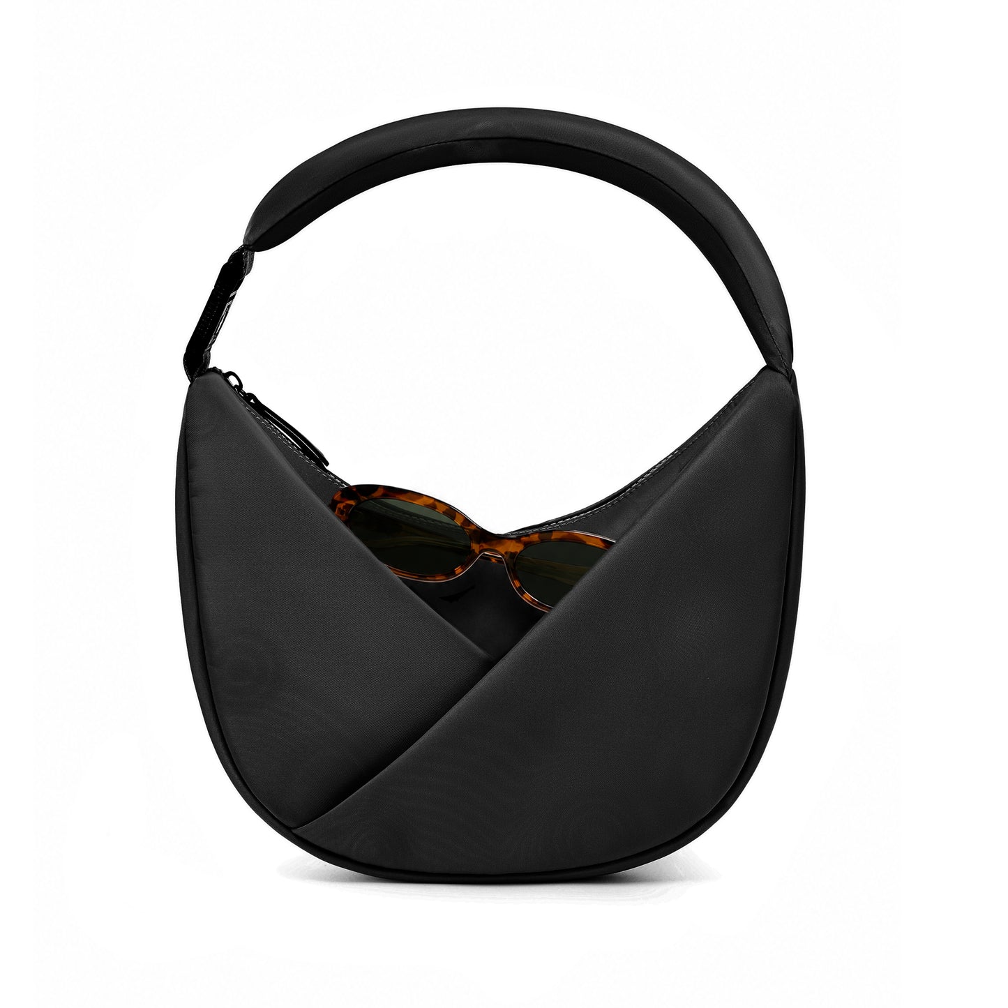 Black handbag with sunglasses on a white background