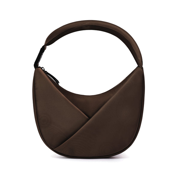 Espresso handbag with a unique design on a white background