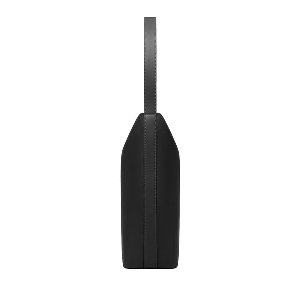 Standalone shot of the black Origami Hobo Bag's tapered, pointed base and minimalist form.