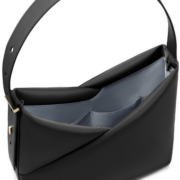 Open top-down view of the black Origami Hobo Bag showing its roomy compartments and grey-blue lining.
