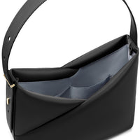 Open top-down view of the black Origami Hobo Bag showing its roomy compartments and grey-blue lining.
