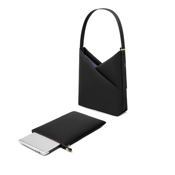 Black Origami Hobo Bag shown with its detachable padded laptop sleeve pouch beside it.
