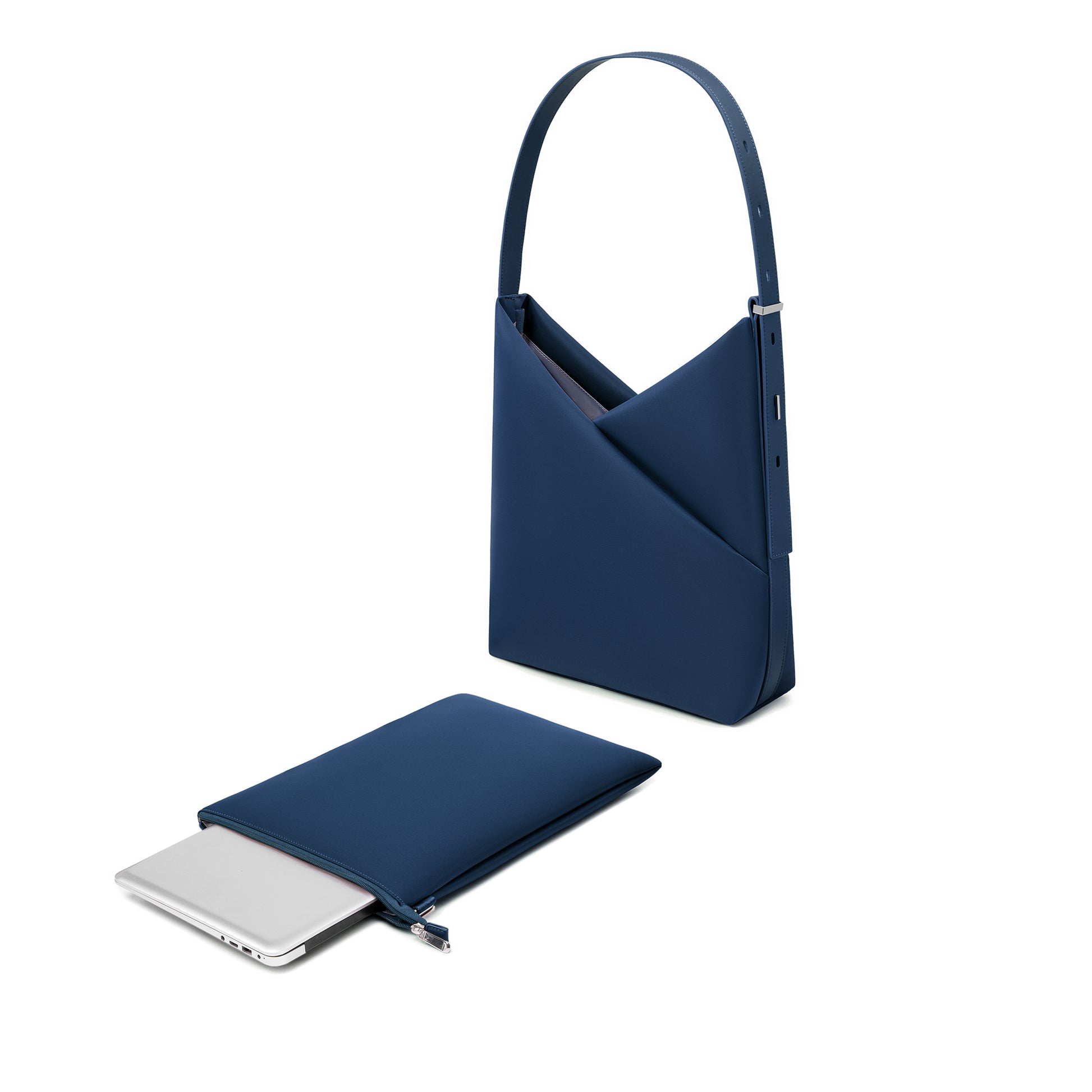 Navy Origami Hobo Bag shown with its detachable padded laptop sleeve pouch beside it.