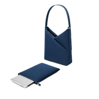 Navy Origami Hobo Bag shown with its detachable padded laptop sleeve pouch beside it.