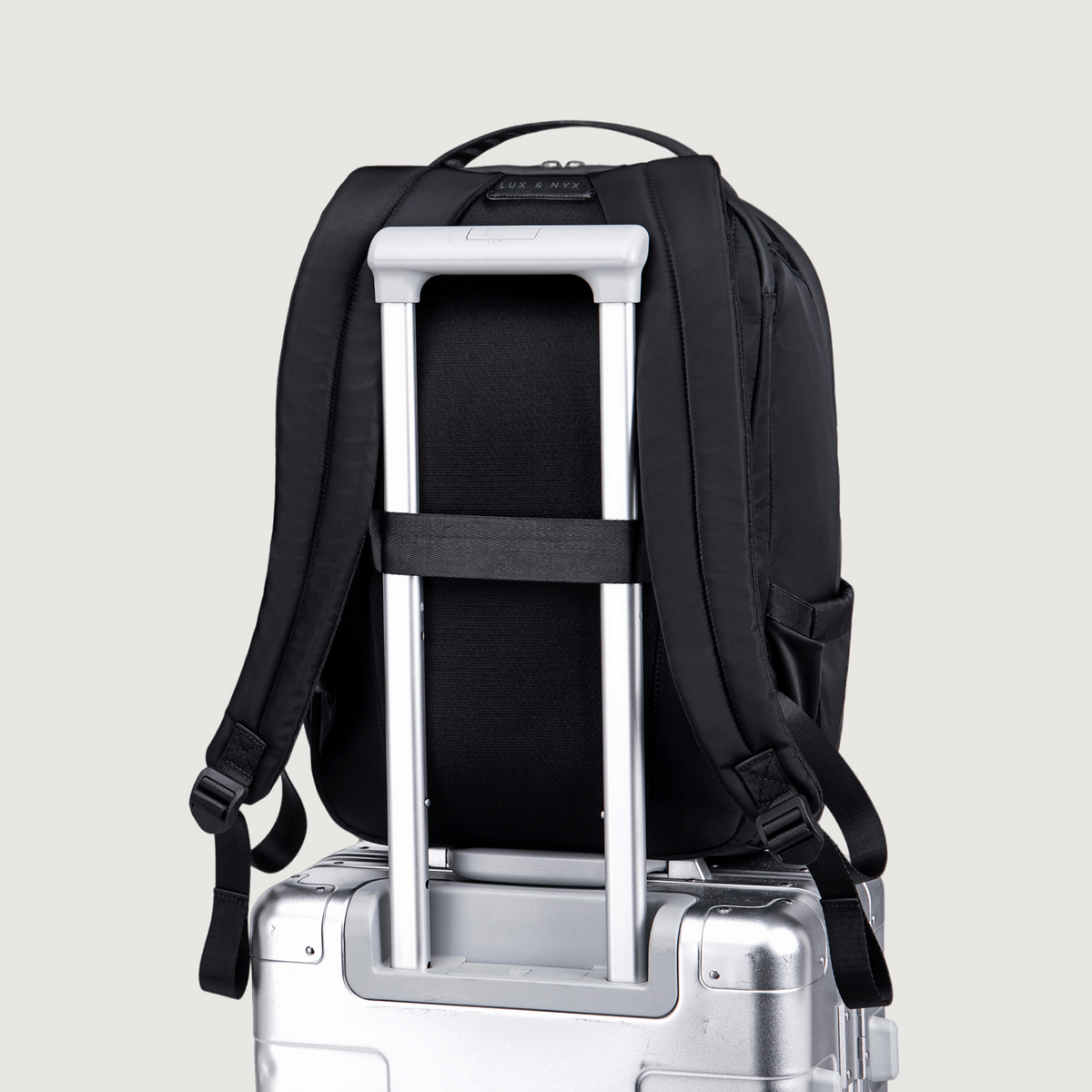 Lux & Nyx Origami Backpack - 16" Laptop Backpack With Trolley Strap - Black - Backpack Slipped Onto Luggage Trolley