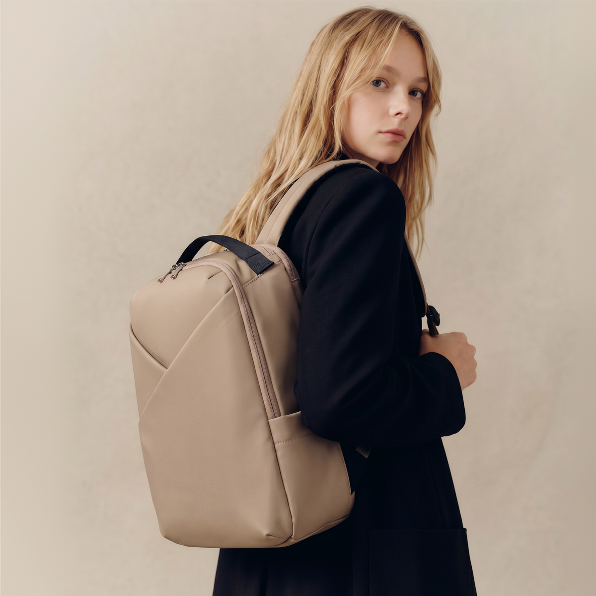 Lux & Nyx Origami Backpack - 16" Laptop Backpack With Trolley Strap - 
Champagne Taupe - Styled with Model
