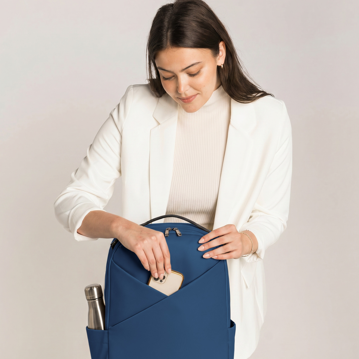 Lux & Nyx Origami Backpack - 16" Laptop Backpack With Trolley Strap - 
Navy - opening front pocket.