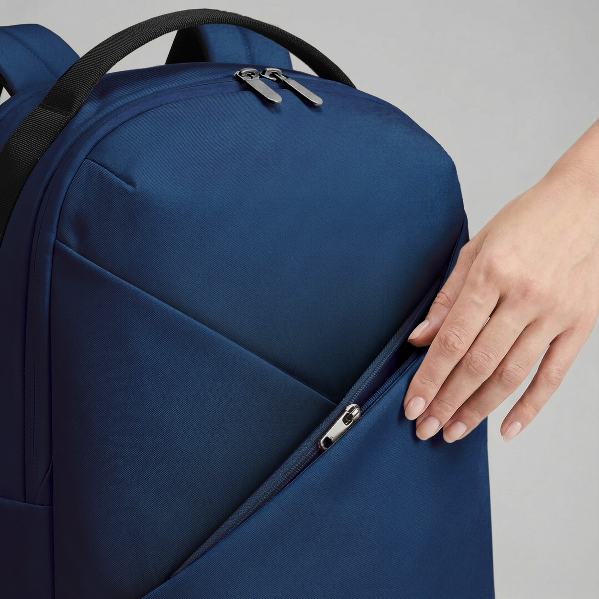 Lux & Nyx Origami Backpack - 16" Laptop Backpack With Trolley Strap - 
Navy - hand on front pocket