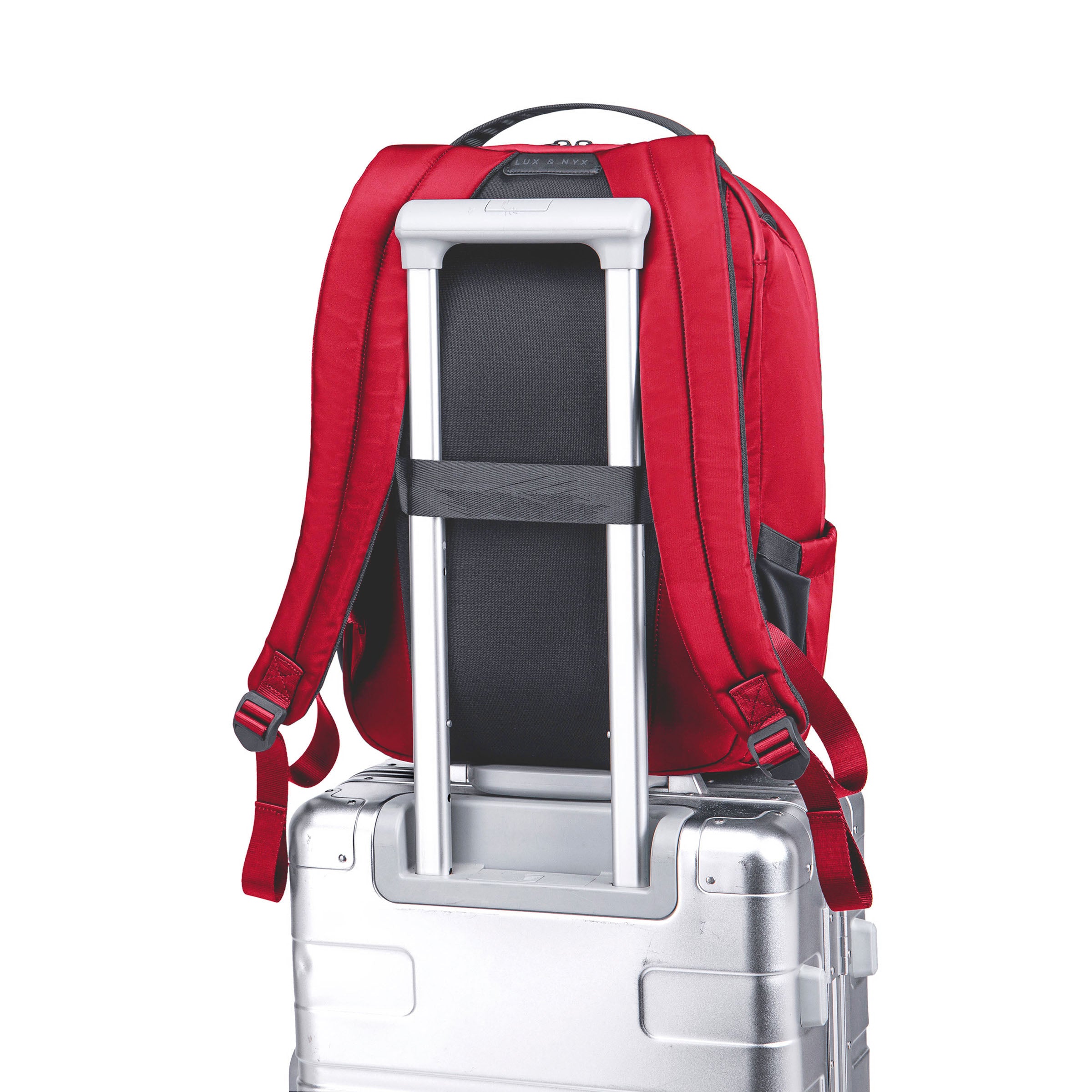 Lux & Nyx Origami Backpack - 16" Laptop Backpack With Trolley Strap - Cardinal Red - Backpack Slipped Onto Luggage Trolley