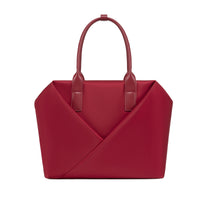Lux & Nyx crimson red handbag with a geometric V-shaped envelope front panel and dual top handles.