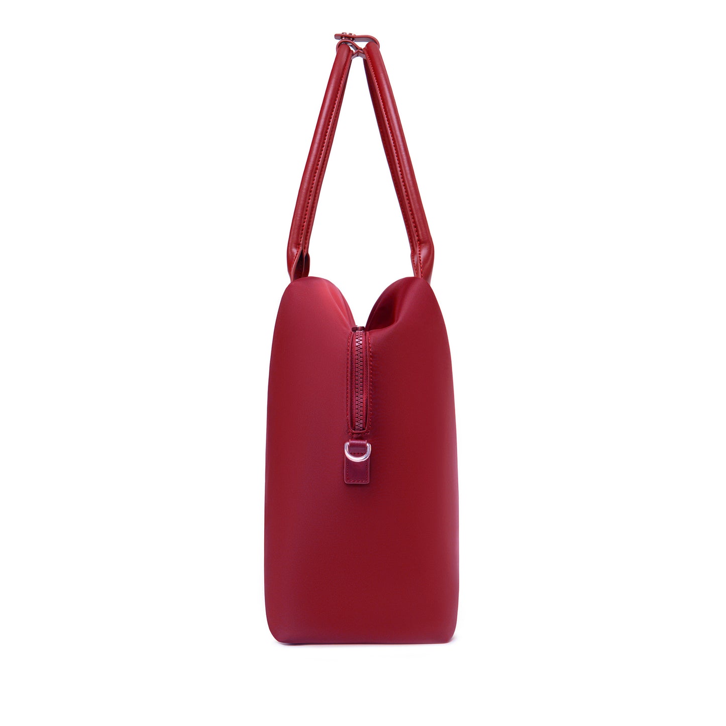 Side profile of a crimson red origami handbag highlighting its slim depth, arched top handles, and clasp closure.
