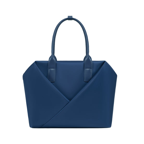 Lux & Nyx navy blue handbag with a geometric V-shaped envelope front panel and dual top handles.