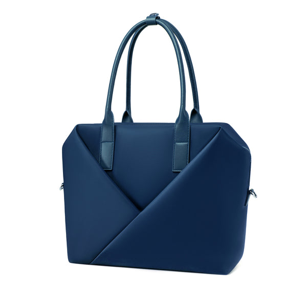 Angled view of a top-handle navy blue satchel silhouette with front V-seam detail.