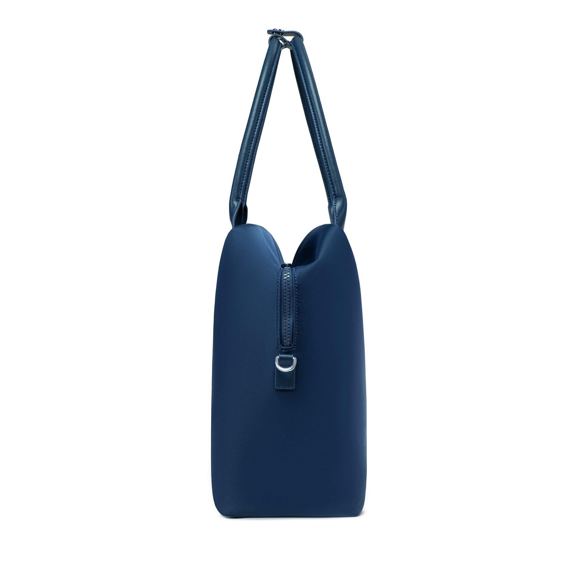Side profile of a navy blue origami handbag highlighting its slim depth, arched top handles, and clasp closure.
