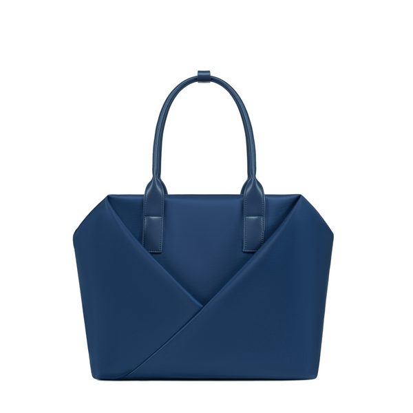 Lux & Nyx Navy handbag with a geometric V-shaped envelope front panel and dual top handles.