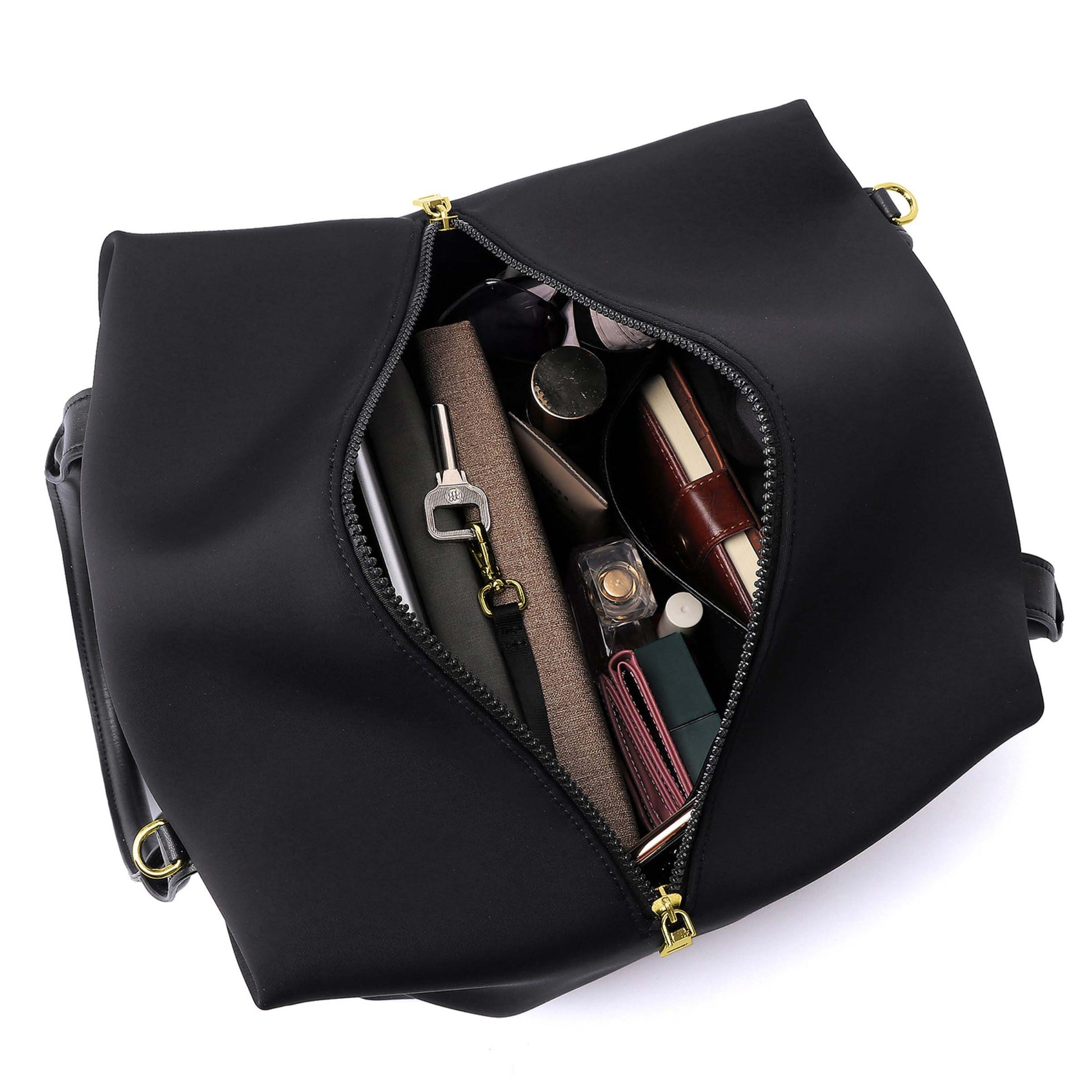 Top view of a Mid Origami handbag displayed with the chain extended to showcase materials, available in black with gold hardware