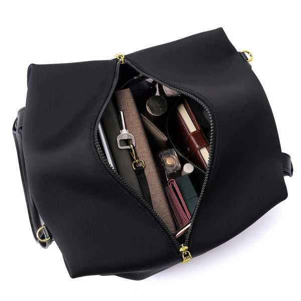 Top view of a Mid Origami handbag displayed with the chain extended to showcase materials, available in black with gold hardware