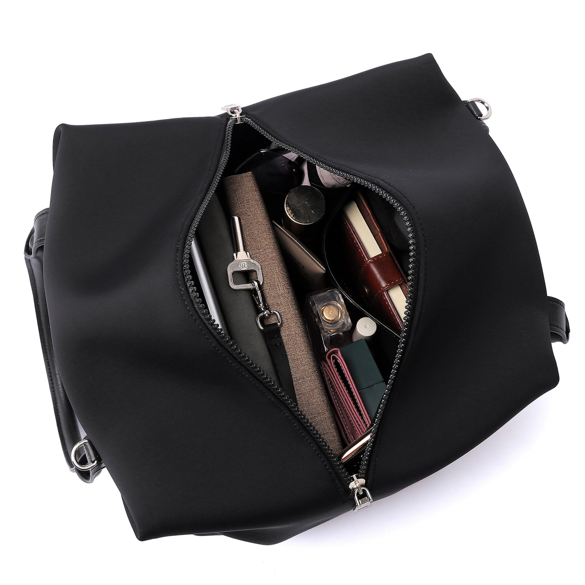 Top view of a Mid Origami handbag displayed with the chain extended to showcase materials, available in black with silver hardware.