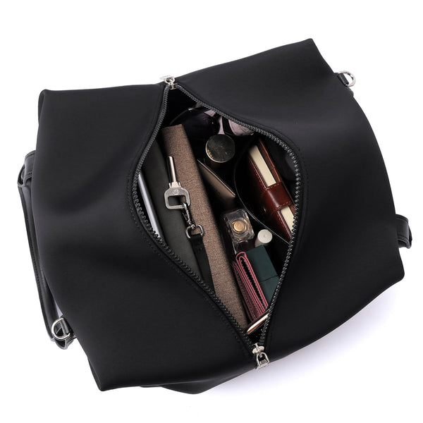 Top view of a Mid Origami handbag displayed with the chain extended to showcase materials, available in black with silver hardware.