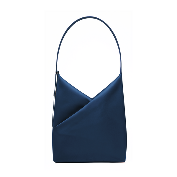 Lux & Nyx Origami Hobo Bag in navy, front view, showing the signature geometric origami fold and single curved shoulder handle.