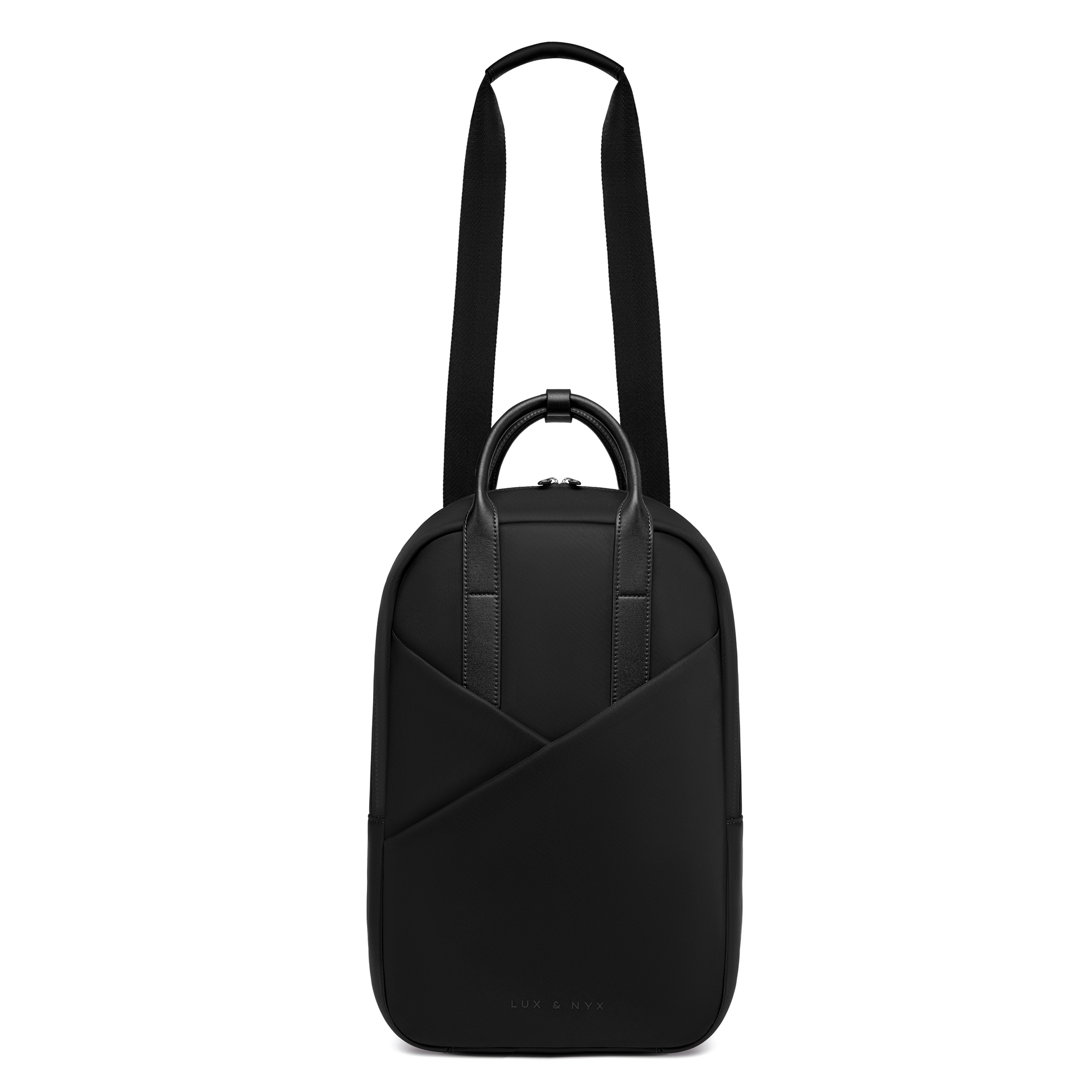 Origami Slim Black  Backpack worn crossbody style, showing adjustable strap