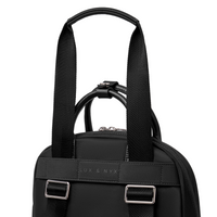 Origami Slim Backpack rear view showing back panel, straps, and top handle hardware detail