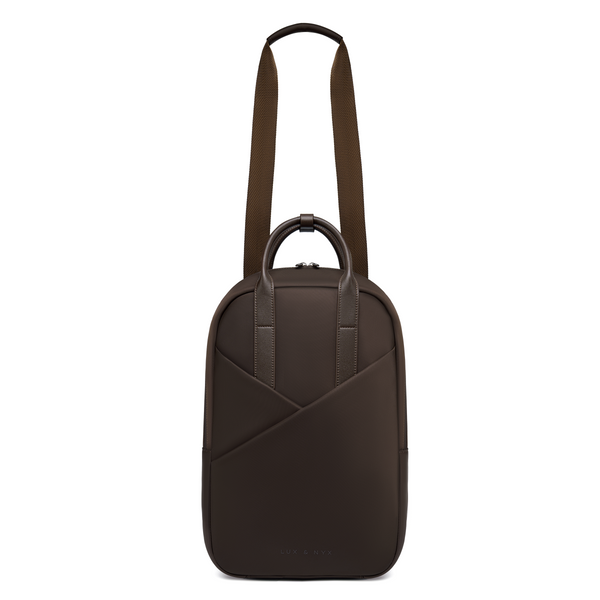 Origami Slim Espresso Backpack worn crossbody style, showing adjustable strap