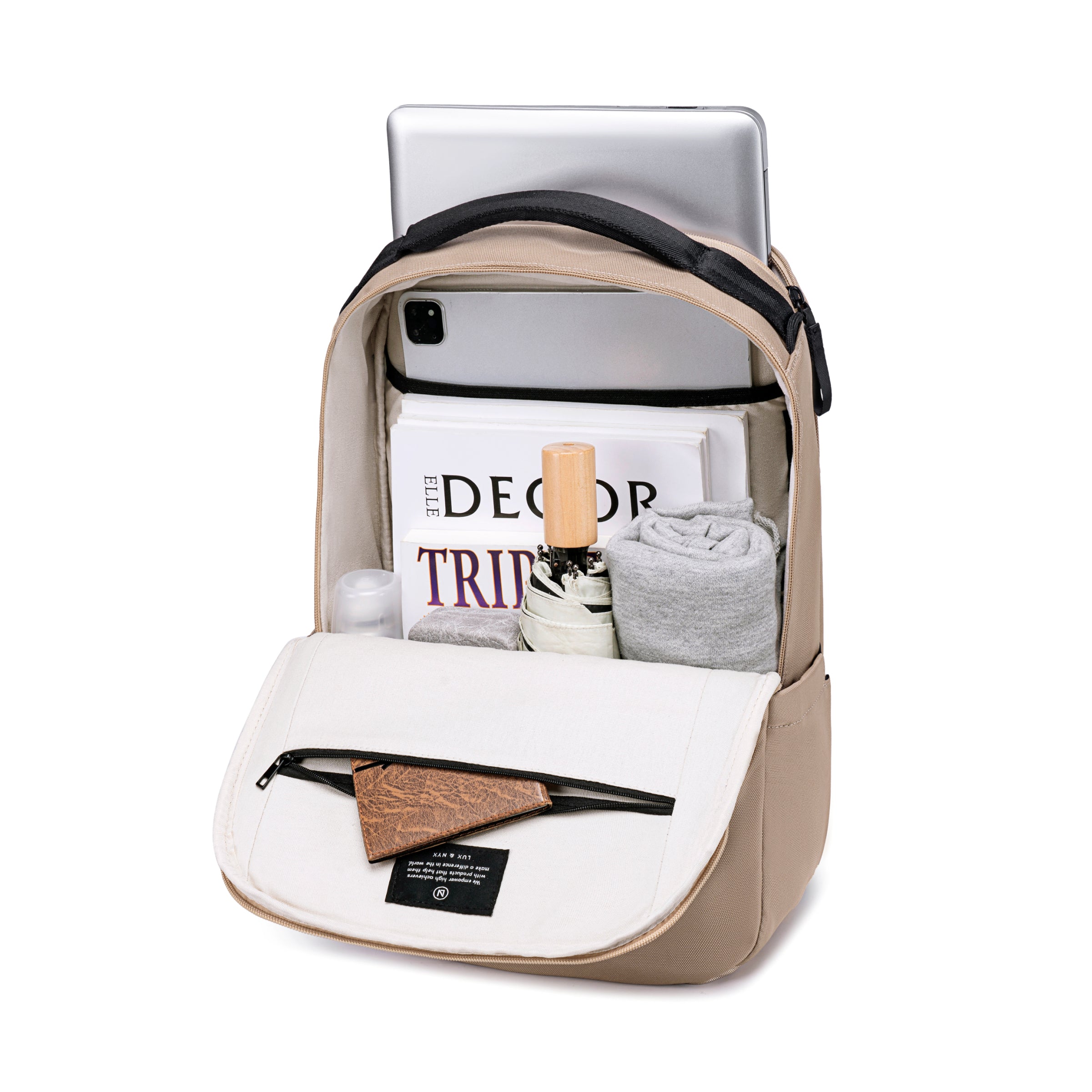 Lux & Nyx Purpose Backpack - 16" Laptop Backpack With Trolley Strap - Light Beige - Backpack Quarter View of Internal Compartments With Backpack Contents