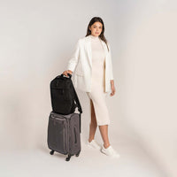 Lux & Nyx Purpose Backpack - 16" Laptop Backpack With Trolley Strap - Black - Professional Woman With A Purpose Backpack Slipped Onto Luggage Trolley