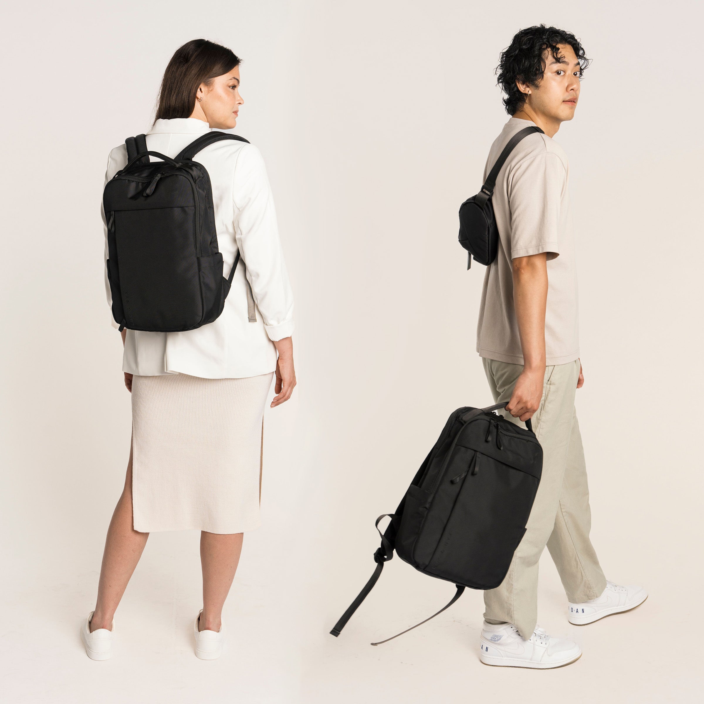 Lux & Nyx Purpose Backpack - 16" Laptop Backpack With Trolley Strap - Black - Professional Woman Wearing The Purpose Backpack in Black, and a Professional Man Wearing The Purpose Backpack in Black and The Origami Belt Bag in Black
