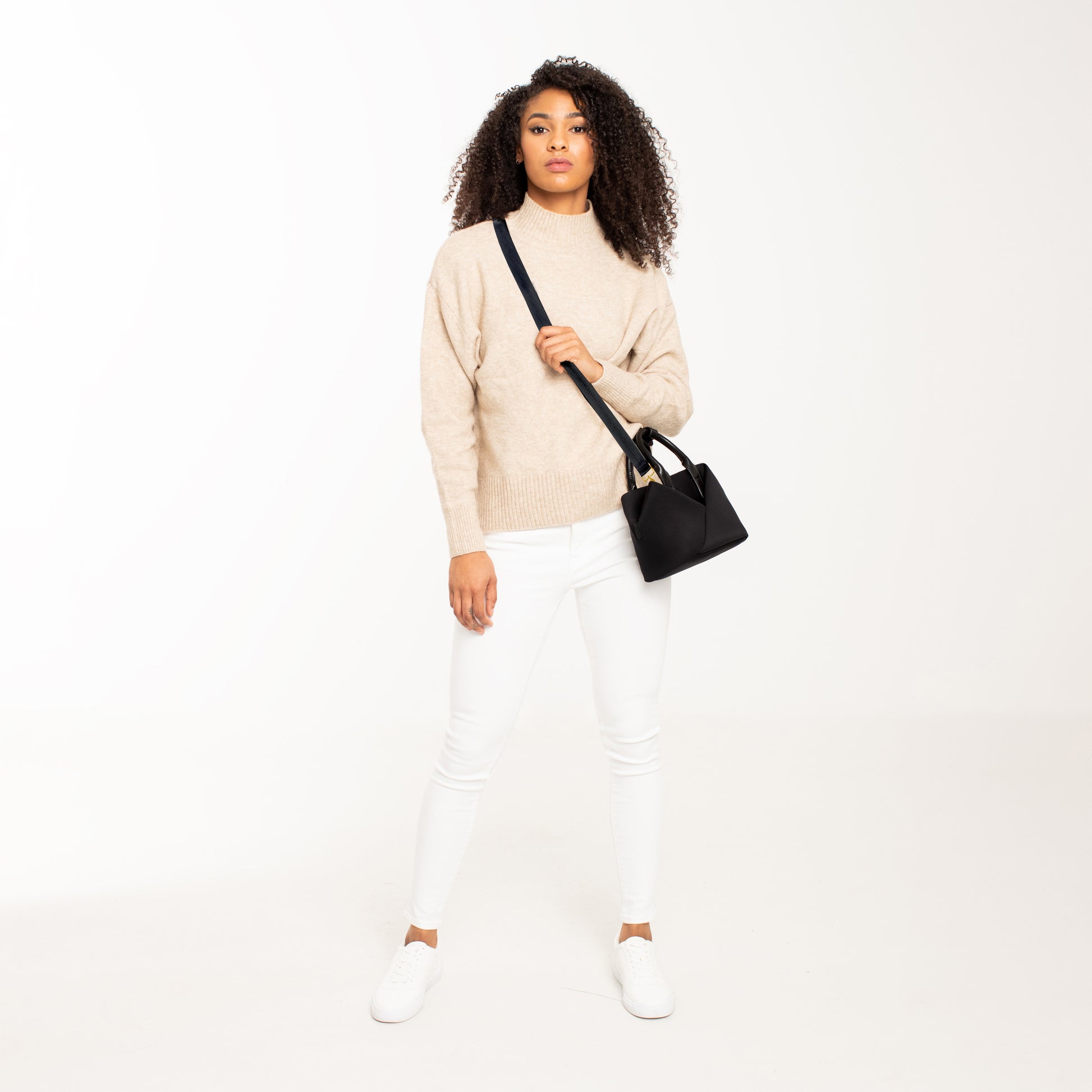 Lux & Nyx Small Origami Crossbody & Handbag Tote Ultra Matte  - Black + Gold Hardware & Black + Silver Hardware - Woman Wearing The Tote in Crossbody Mode