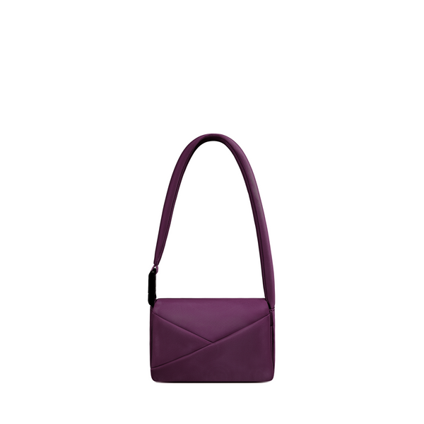 Lux & Nyx Origami Flap Bag in Wine, crossbody bag presented in its alternate wear as a mini shoulder bag.