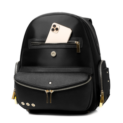Lux & Nyx Little Zoe Backpack - 13" Laptop Backpack With Detachable 5-Way Wear Crossbody Clutch - Black - Backpack Quarter View With A Phone Inside The Exterior Zipped Front Pocket