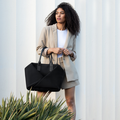 Lux & Nyx Large Origami Tote Ultra Matte - 15" Laptop Tote With Luggage Sleeve - Black - Professional Woman Holding The Origami Tote