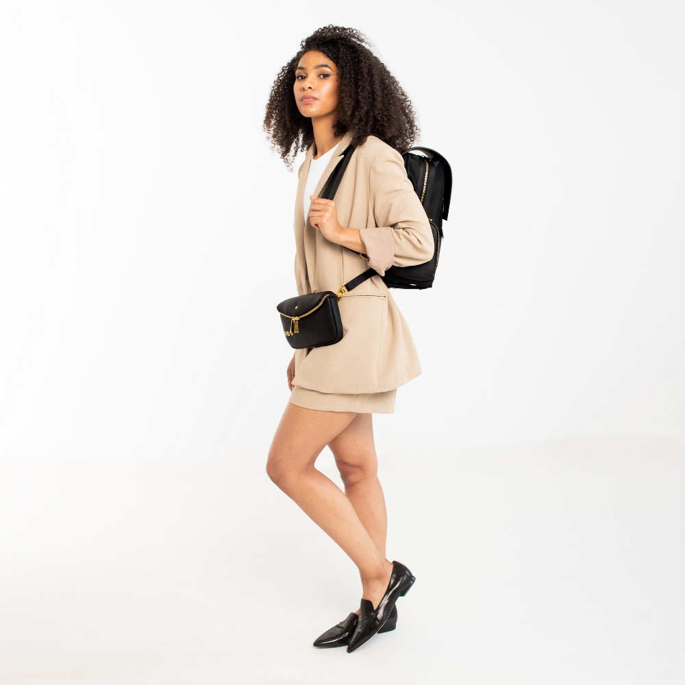 Lux & Nyx Little Zoe Backpack - 13" Laptop Backpack With Detachable 5-Way Wear Crossbody Clutch - Black - A Professional Woman Wearing The Backpack and The Detachable 5-Way Wear Crossbody Clutch in Belt Bag Mode